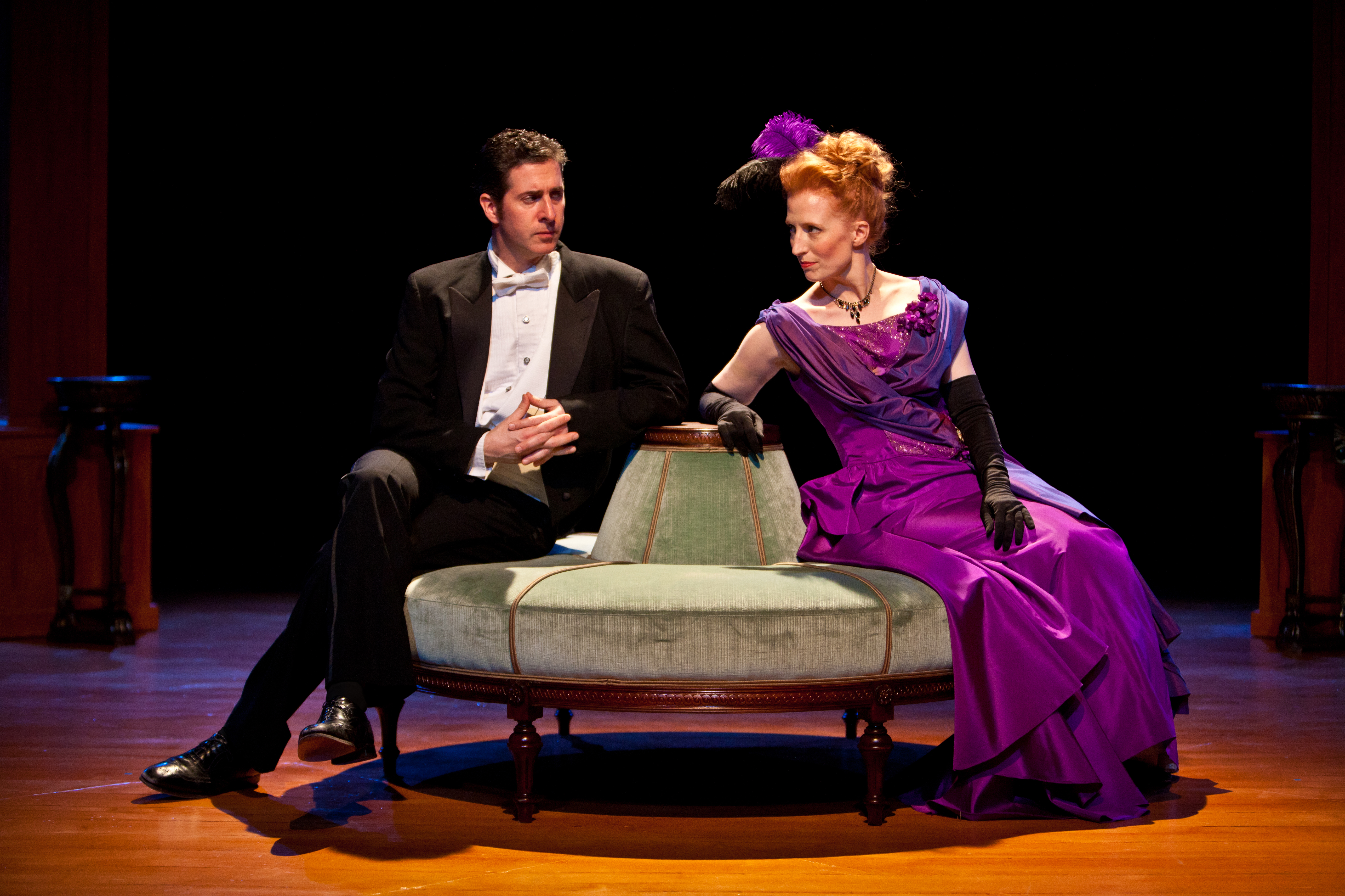 Group theatre in minneapolis - a man and woman sitting on a stage